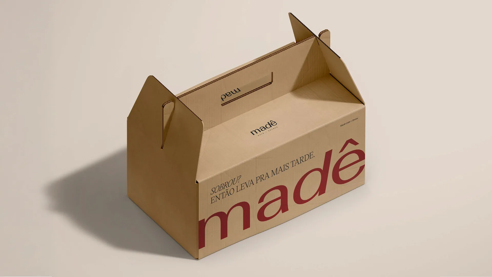 Embalagem para viagem com a marca Madê